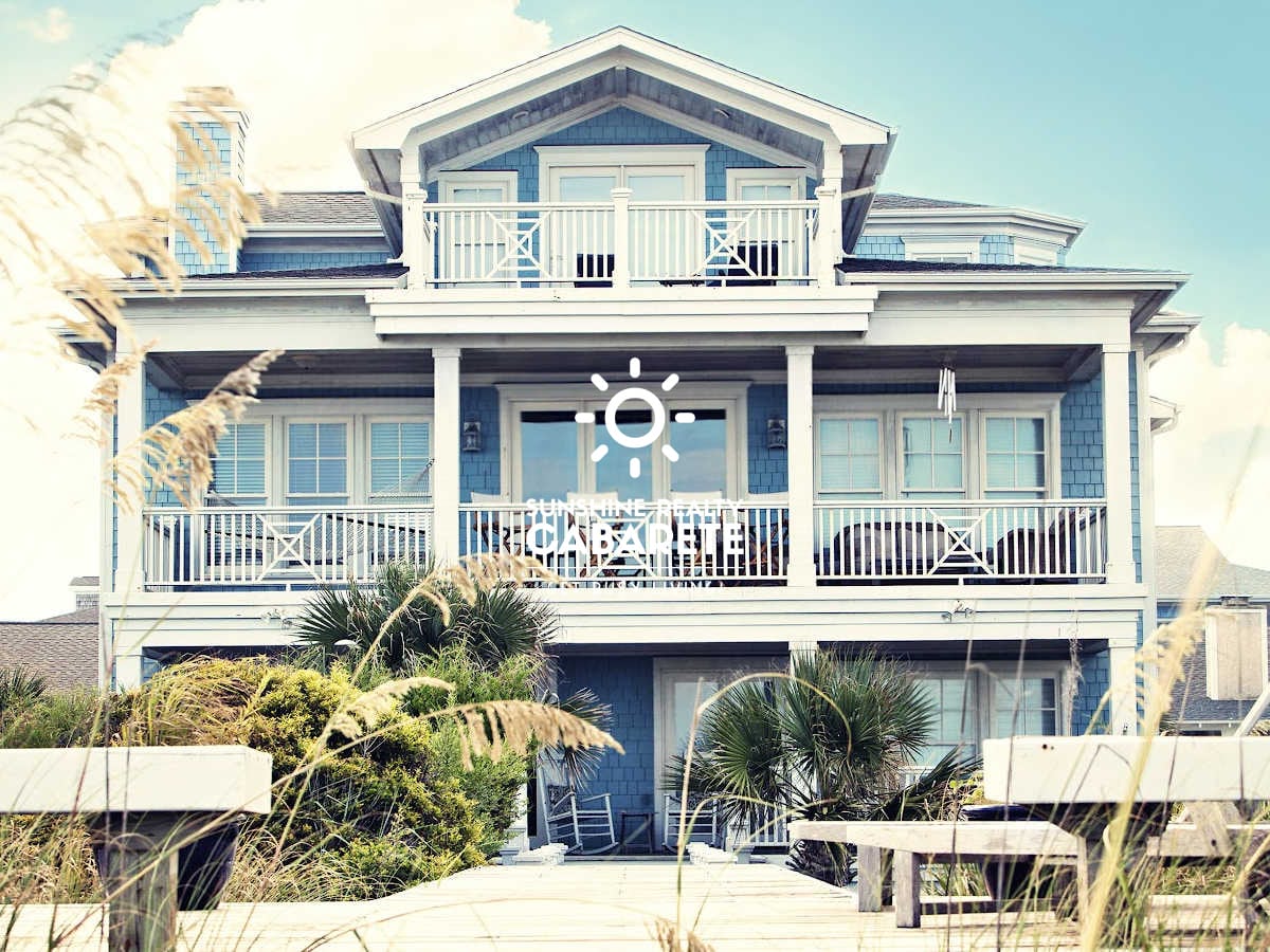 Image of a two story beach house on Cabarete beach in the Dominican Republic